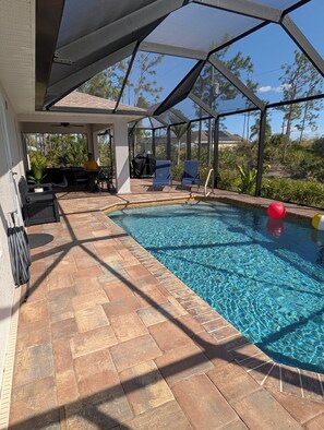 Outdoor pool, a heated pool - Charming 3-bedroom house with AC in Englewood, heated pool, 5 miles to beach (Englewood)