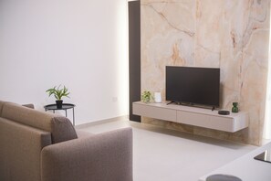 Smart TV - ARQO Comfort Apartment – One Bedroom with Living Room (Marcianise)