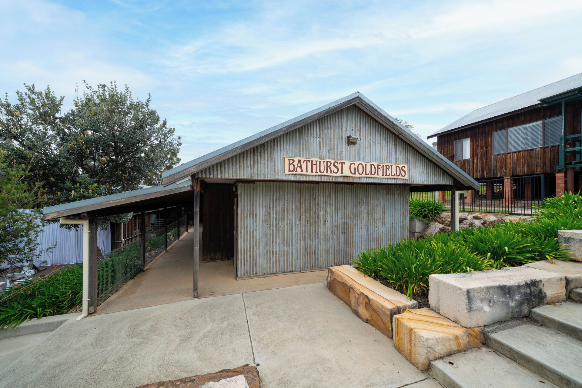 A rustic building with a sign reading 'Bathurst Goldfields.'