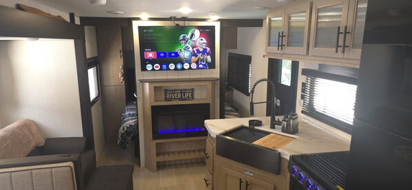 Interior - New River RV Travel Trailer with 1 King bedroom and bunks - 2 small children. (Prince)