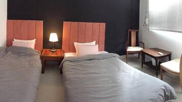 Twin Room, Multiple Beds | In-room safe, iron/ironing board