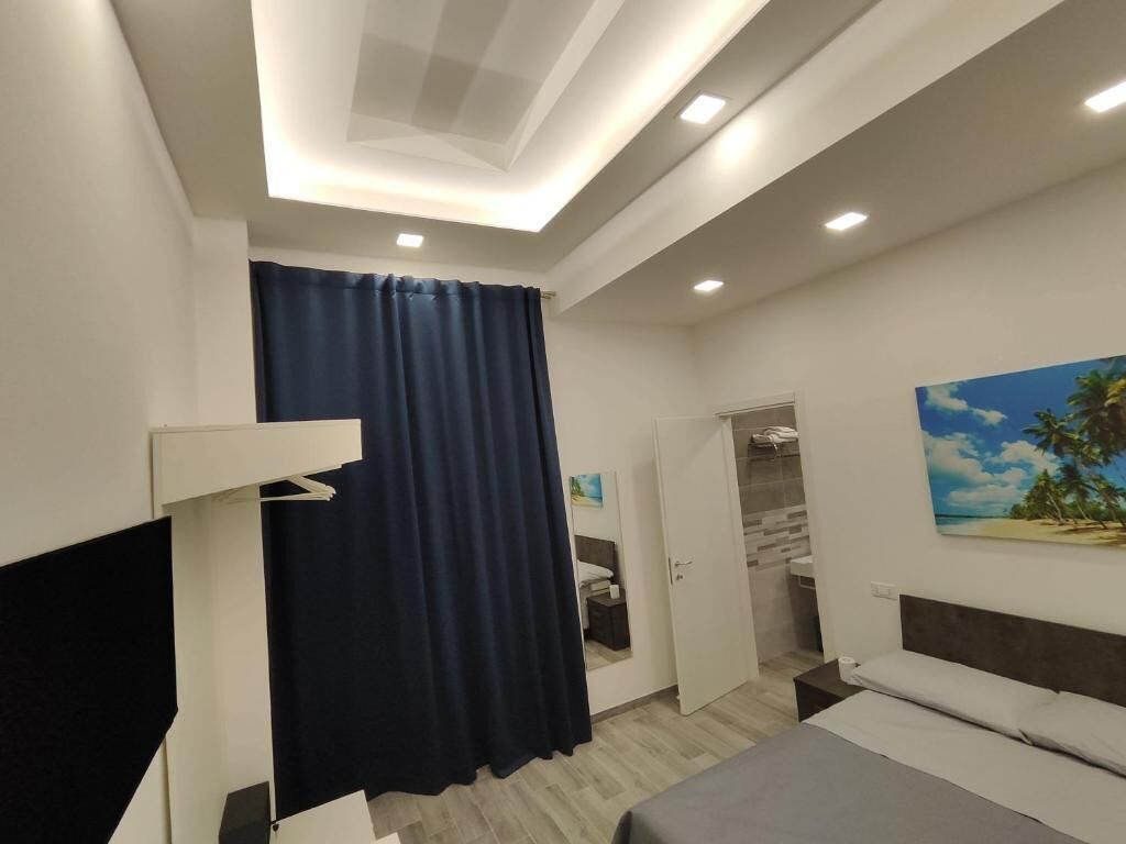 Comfort Double Room, Courtyard View | In-room safe, desk, laptop workspace, blackout drapes