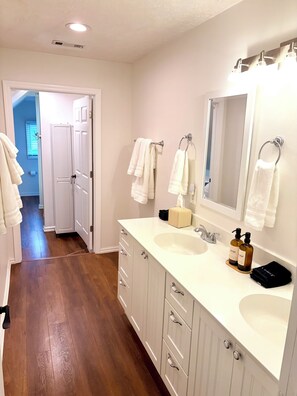 Eco-friendly toiletries, hair dryer, towels, soap