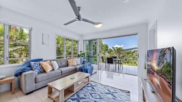 Deluxe Apartment, Balcony, Sea View | Living area