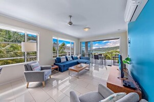 Deluxe Apartment, Balcony, Sea View | Living area