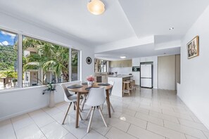 Deluxe Apartment, Balcony, Sea View | Dining - Summit Apartments Airlie Beach (Airlie Beach)