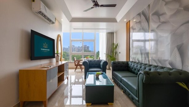 Studio Suite | Area keluarga | Smart TV, perapian, meja tenis meja, dan buku