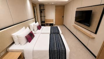 Deluxe Double or Twin Room | Minibar, in-room safe, desk, laptop workspace