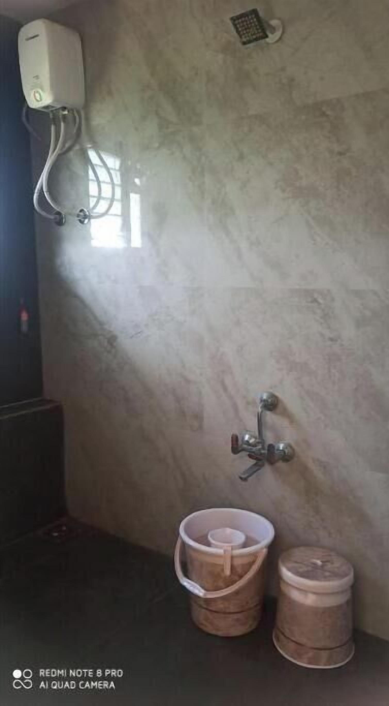 Shower, shampoo, toilet paper