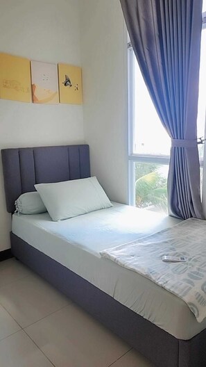 Apartment, 2 Bedrooms | Minibar, free WiFi - Vida View Apartment by Djitu Hospitality (Makassar)