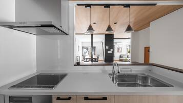 Apartment | Private kitchen | Fridge, microwave, stovetop, dishwasher