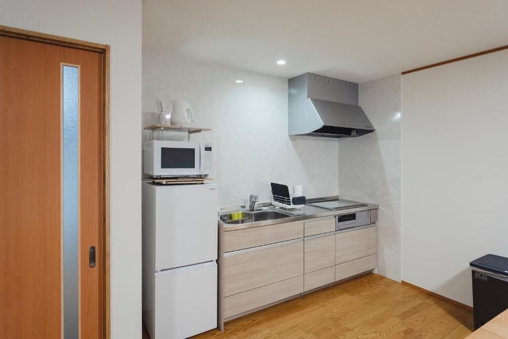 Fridge, microwave, cookware/dishes/utensils