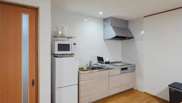 Fridge, microwave, cookware/dishes/utensils