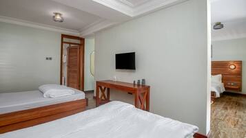 Executive Triple Room, Balcony, Courtyard View | In-room safe, soundproofing, free WiFi, wheelchair access
