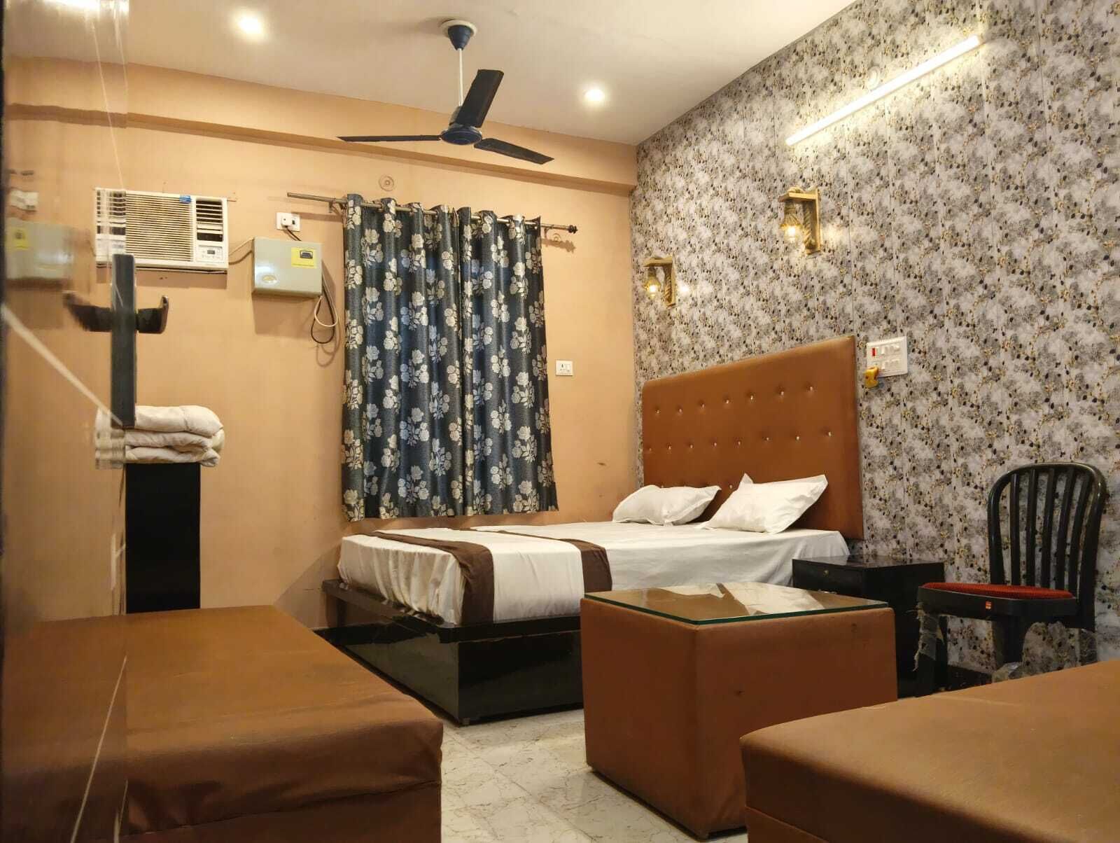 Habitación Deluxe | Camas extra, wifi gratis y ropa de cama 