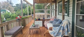 Relax on the deck in Ngunguru.