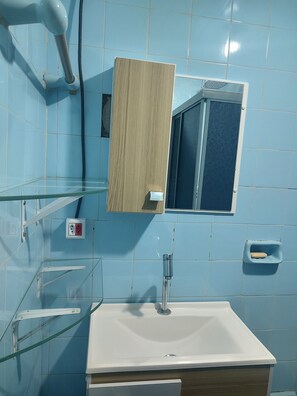 Shower, hair dryer, towels, soap