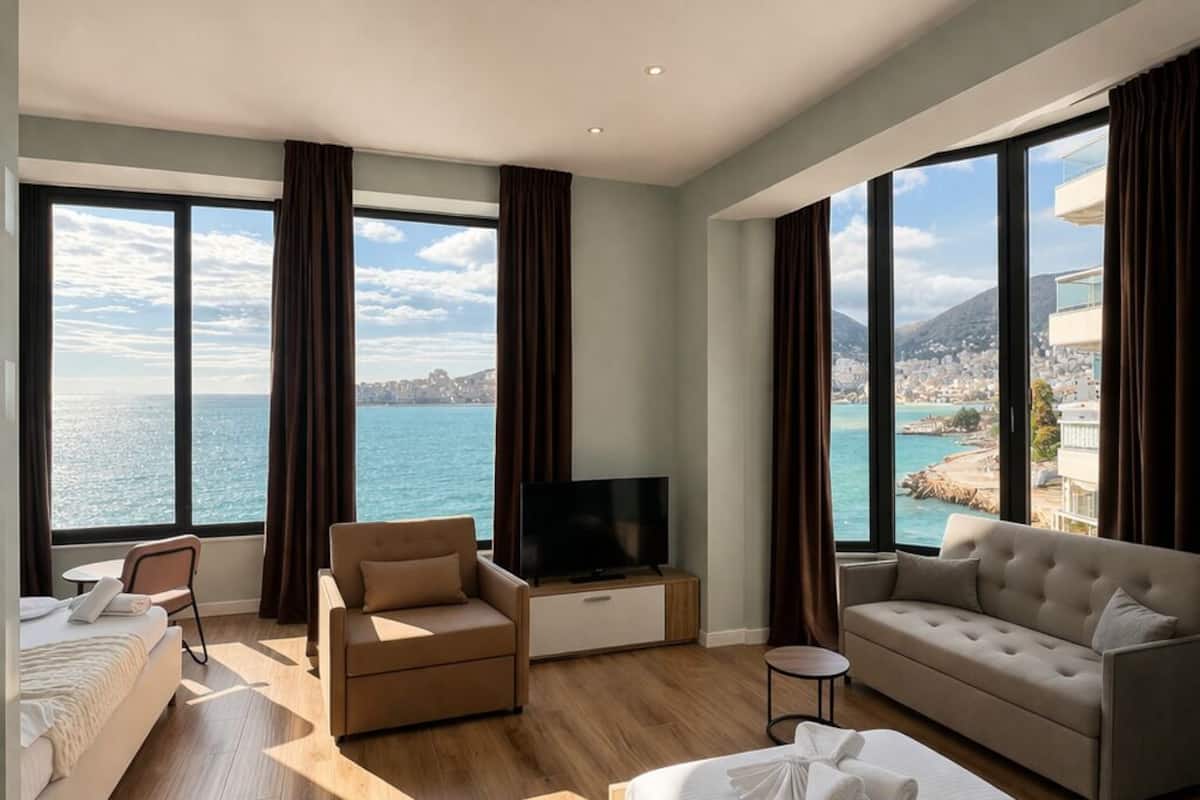 Deluxe Room, Sea View | Iron/ironing board, bed sheets