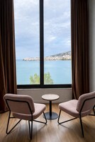 Deluxe Double Room, Sea View | Iron/ironing board, bed sheets