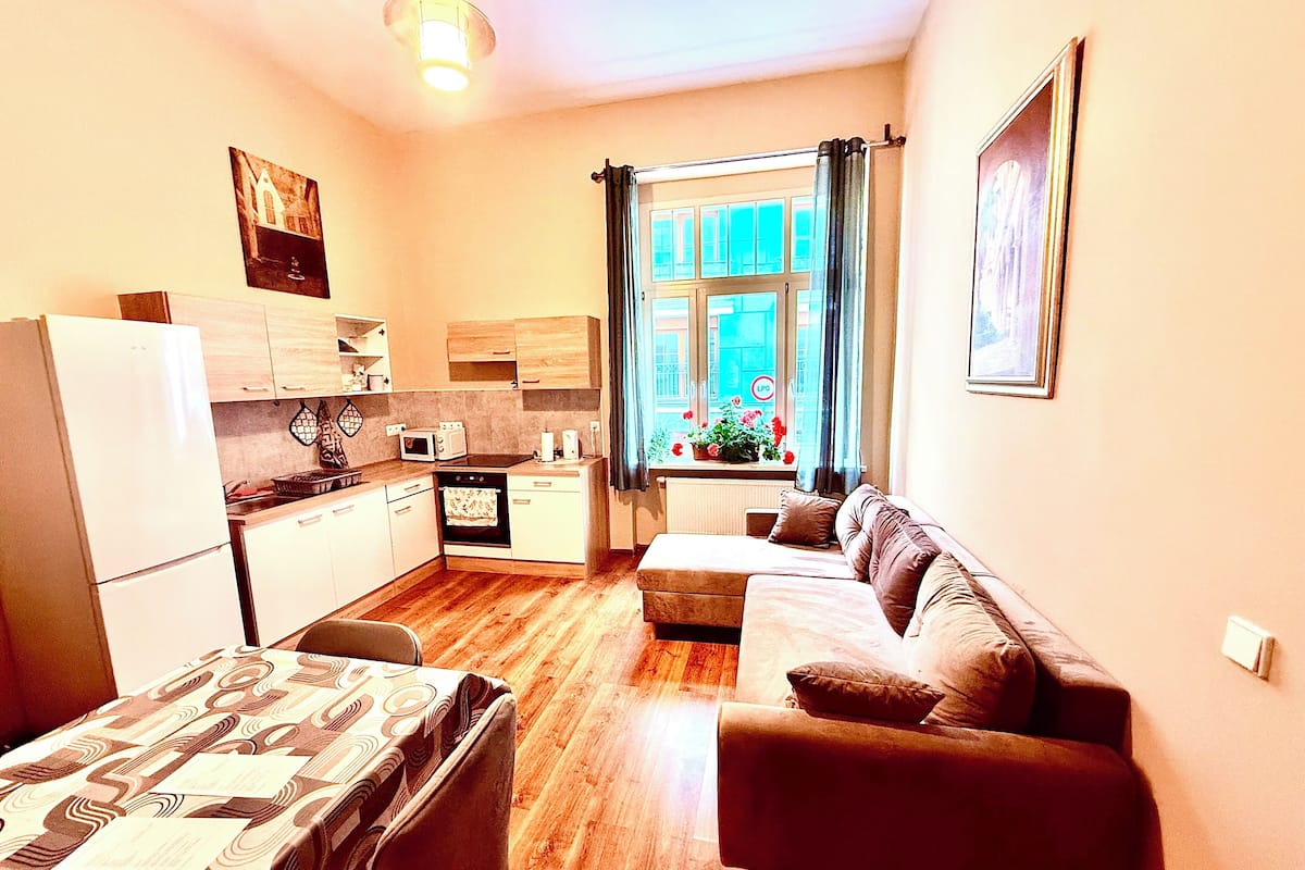 Appartement Deluxe, non-fumeurs, vue ville | Coin séjour