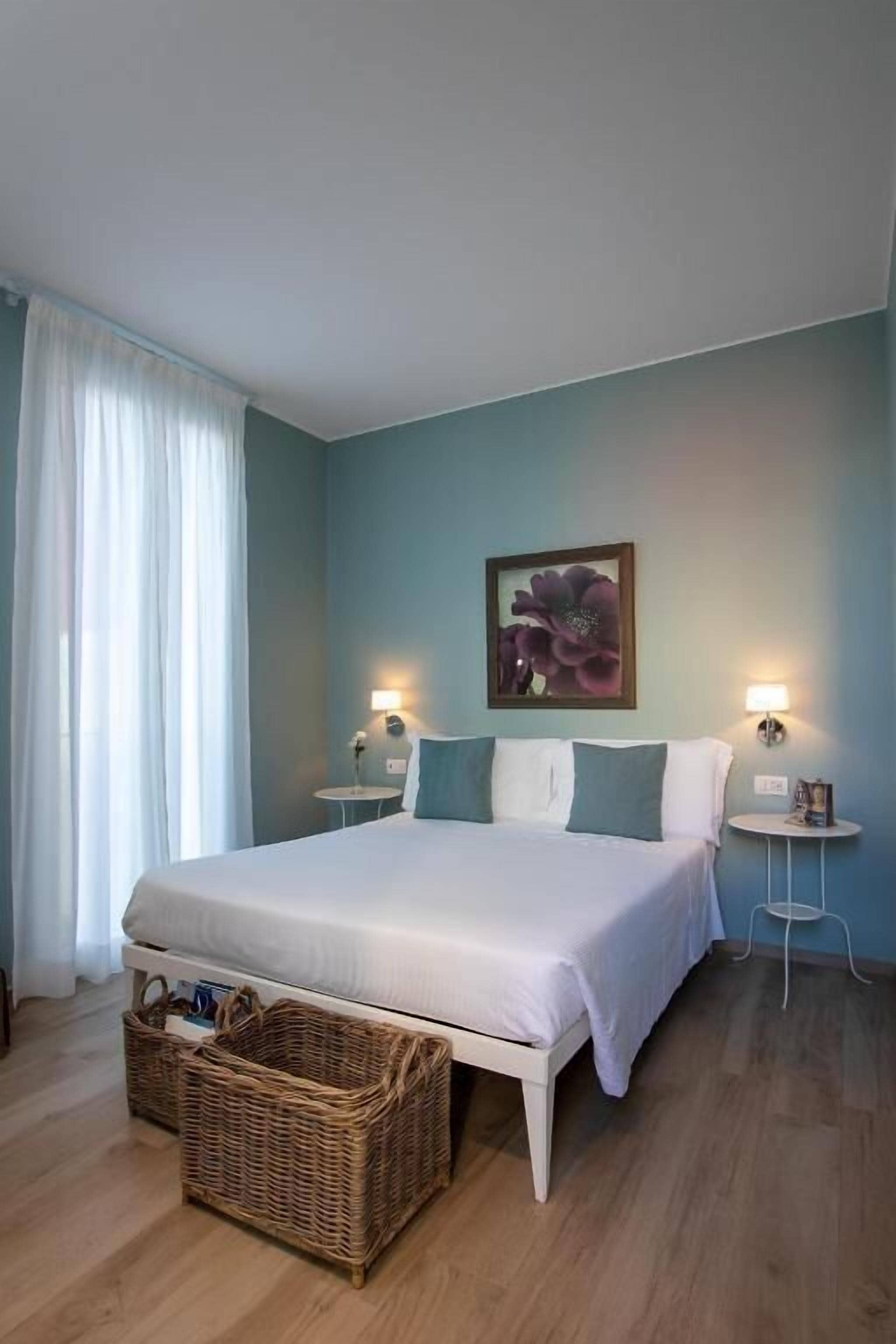 Deluxe Double Room, Sea View | Down comforters, in-room safe, desk, laptop workspace