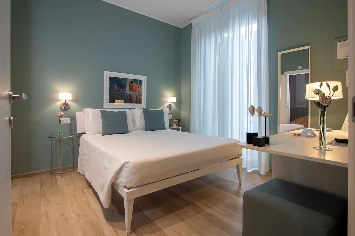 Superior Double Room, Sea View | Down duvets, in-room safe, desk, laptop workspace