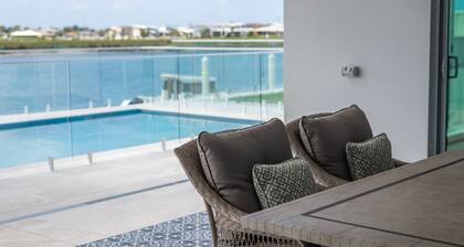 Waterfront. Pool. Boat. Pet-friendly. It doesn’t get better than this.