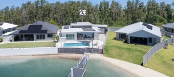 Waterfront. Pool. Boat. Pet-friendly. It doesn’t get better than this.