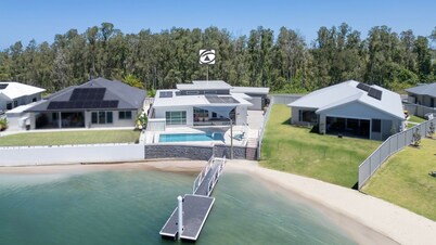 Waterfront. Pool. Boat. Pet-friendly. It doesn’t get better than this.