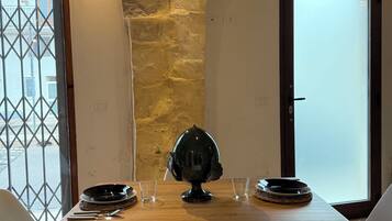 SuĂte estĂșdio conforto | Ărea de estar | TV de tela plana 40 polegadas com canais a cabo