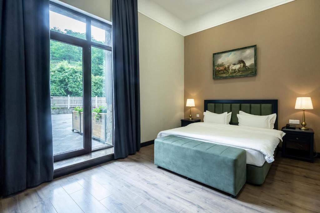 Double Room, Patio, Mountain View | In-room safe, soundproofing, travel crib, free WiFi