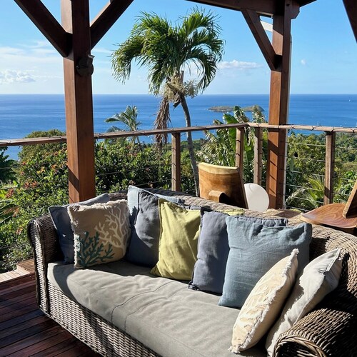 Villa with ocean views of the Cousteau Reserve and an infinity pool