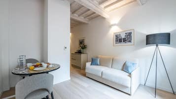 Appart'hÎtel Familial | Coin séjour | Télévision à écran plat