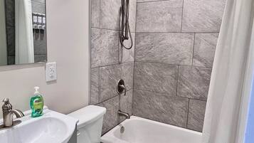 Hair dryer, towels, soap, toilet paper