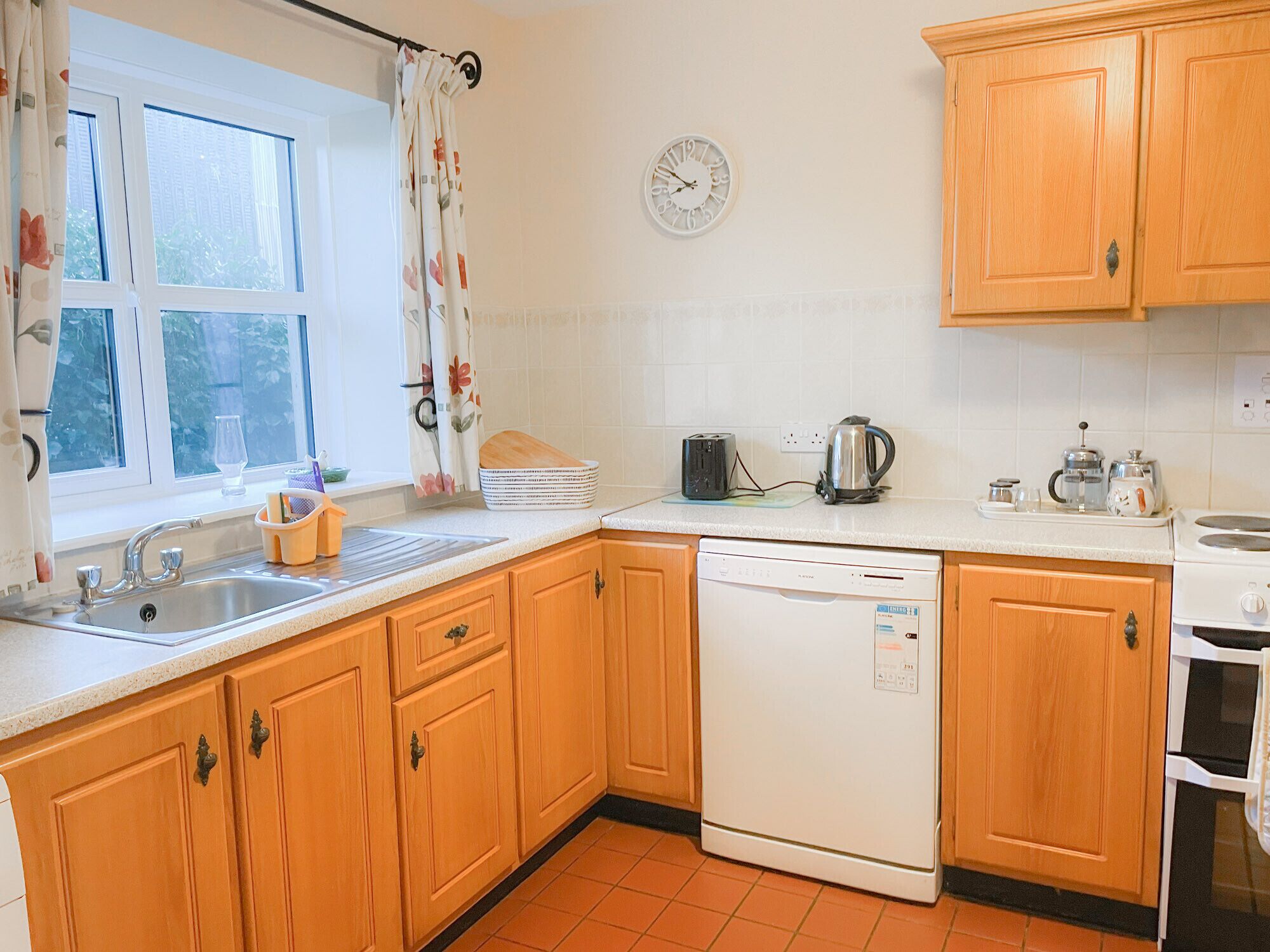 Microwave, dishwasher, high chair, cookware/dishes/utensils