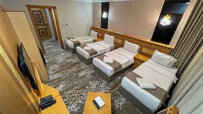 Deluxe Quadruple Room, City View | In-room safe, blackout drapes, iron/ironing board, free WiFi - Rahaf Almashaer Hotel (Makkah)