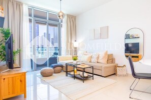 Apartment, Balcony, City View | Living area - Bloomfields 1br The Pearl of Julphar (Abu Dhabi)