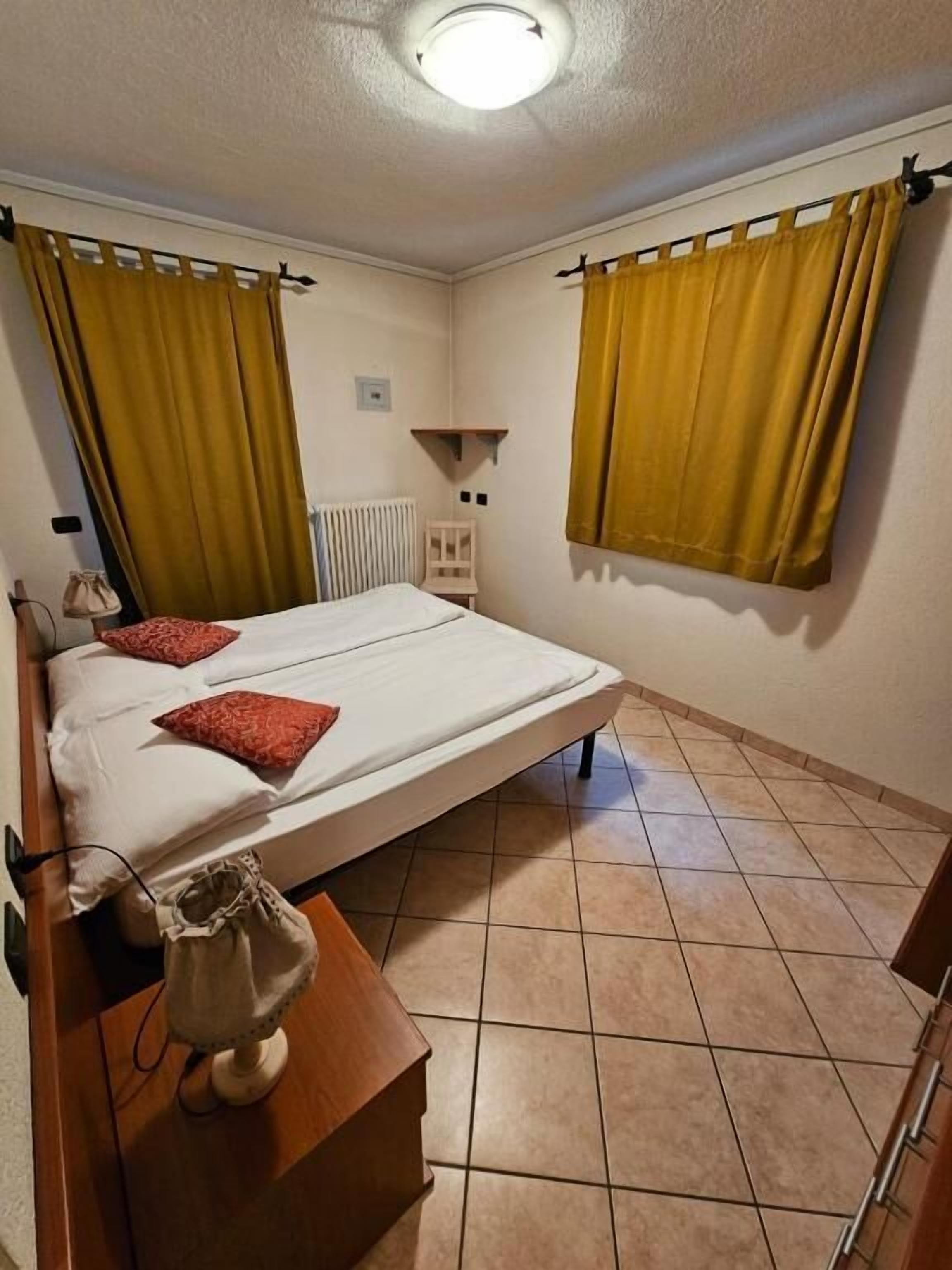 Appartamento, balcone, vista montagna | Una cassaforte in camera, Wi-Fi gratuito