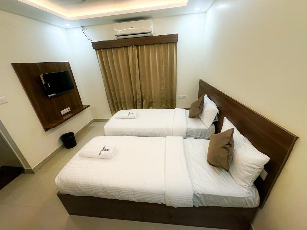 Habitación con 2 camas individuales, vista a la ciudad | Wifi gratis 