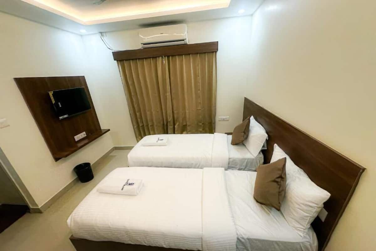 Habitación con 2 camas individuales, vista a la ciudad | Wifi gratis