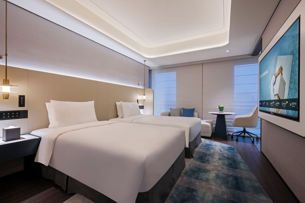 Deluxe Room, 2 Twin Beds | Down comforters, free minibar, laptop workspace, bed sheets