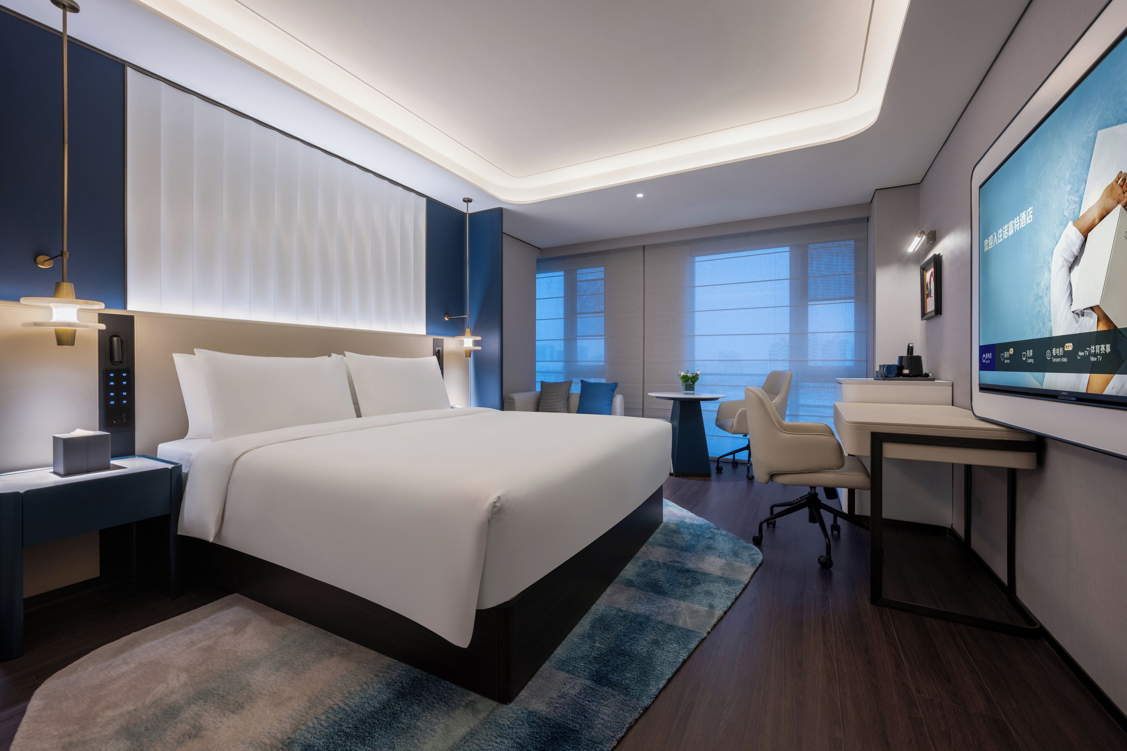 Down comforters, free minibar, laptop workspace, blackout drapes