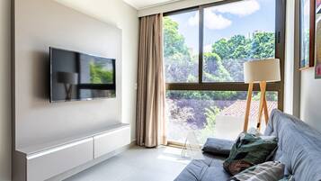 Apartamento conforto | Área de estar | Smart TV, Netflix, serviços de streaming