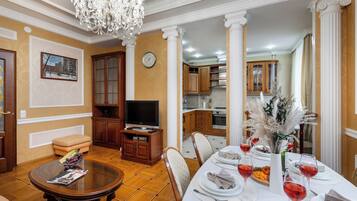 Deluxe Apartment, Non Smoking, Courtyard View | Living area | 30-inch flat-screen TV with satellite channels