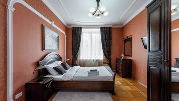 Deluxe Apartment, Non Smoking, Courtyard View | Iron/ironing board, free WiFi