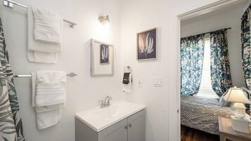 Shower, hair dryer, towels