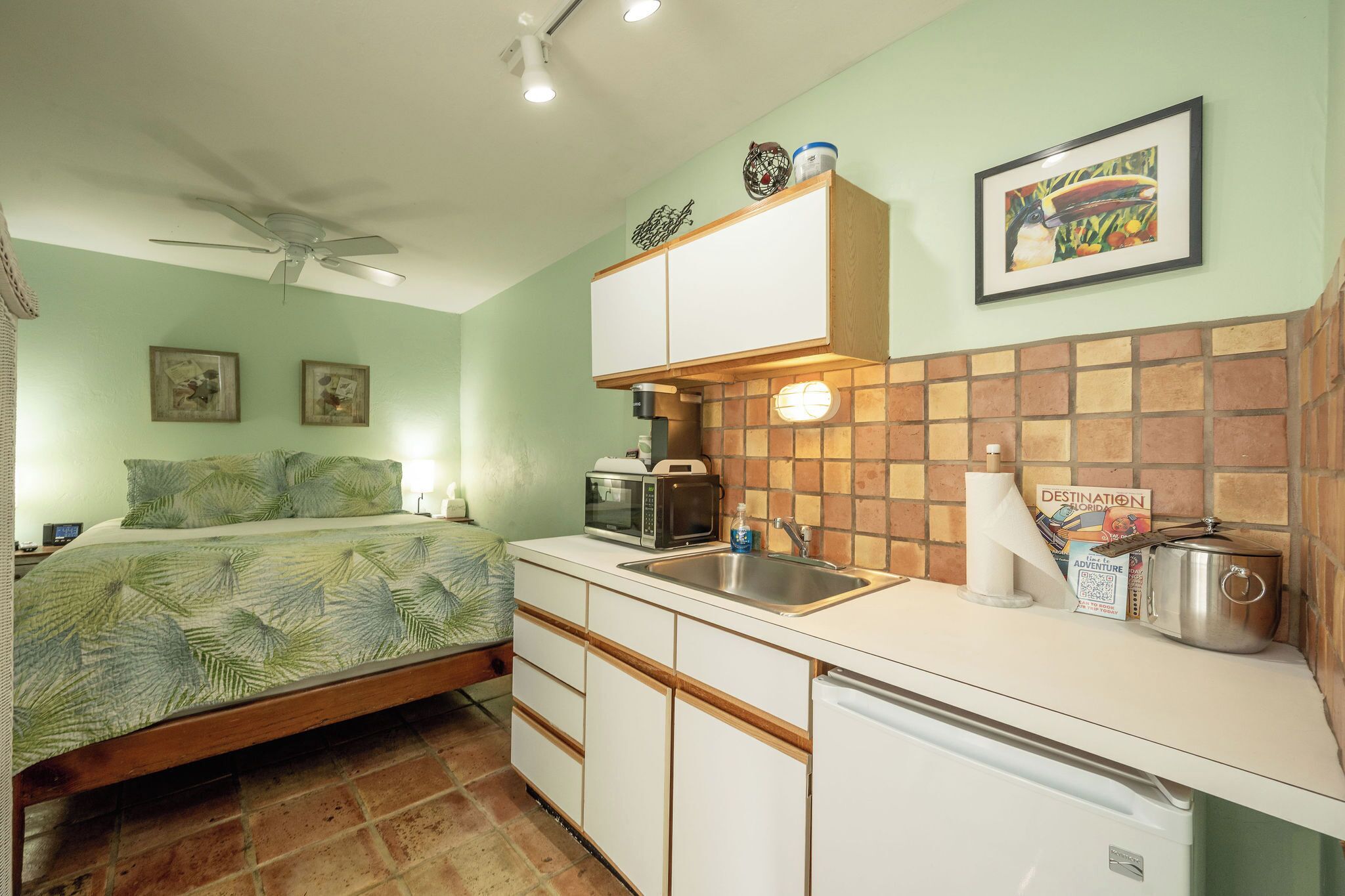 Fridge, microwave, coffee/tea maker, cookware/dishes/utensils