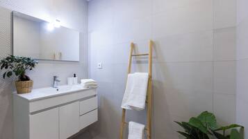 Eco-friendly toiletries, hair dryer, towels, soap