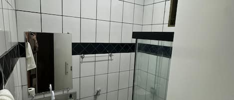 Shower, towels, toilet paper
