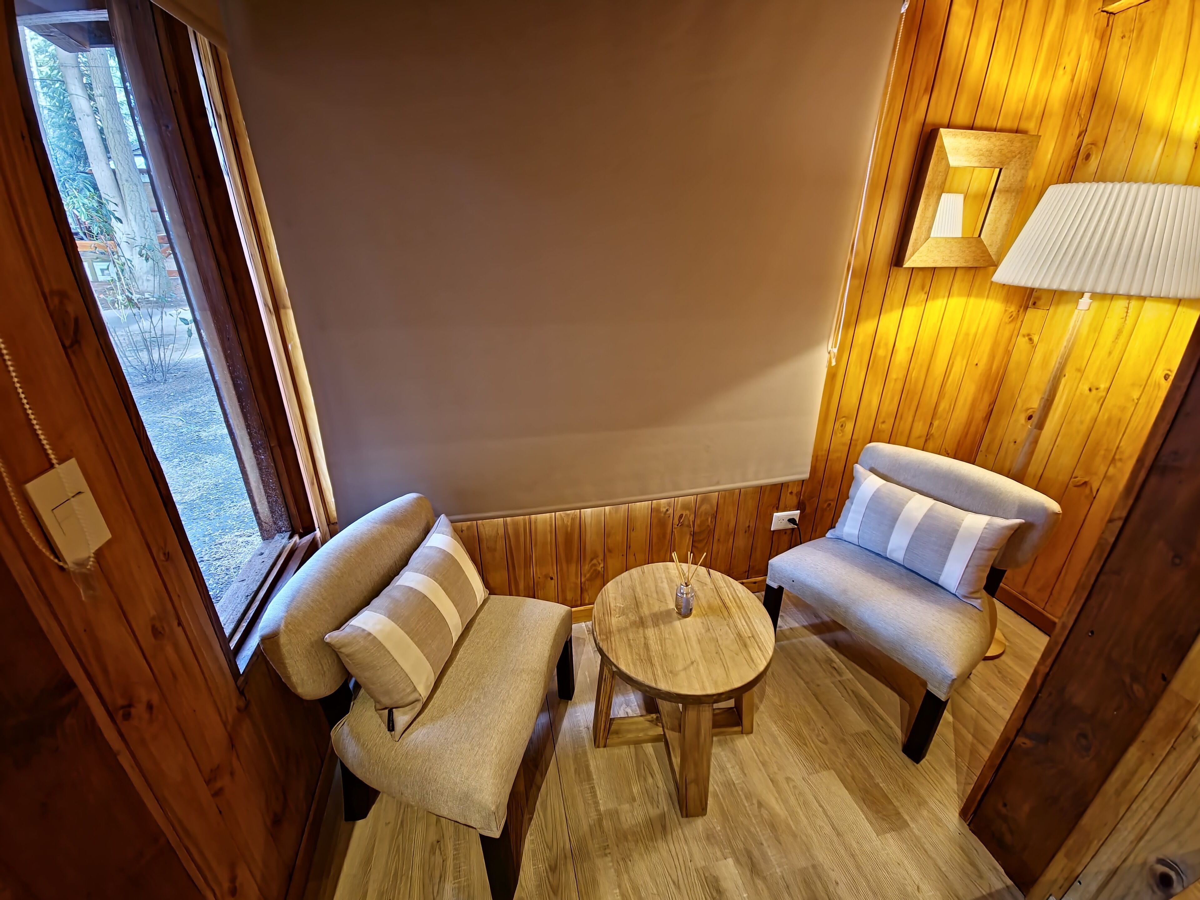 Romantic Loft, Partial Lake View | Living area | 43-inch Smart TV with digital channels